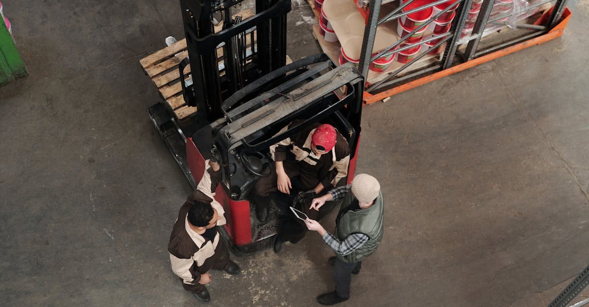 Procurement manager reviewing supplier quotes and material requirements with production schedule data