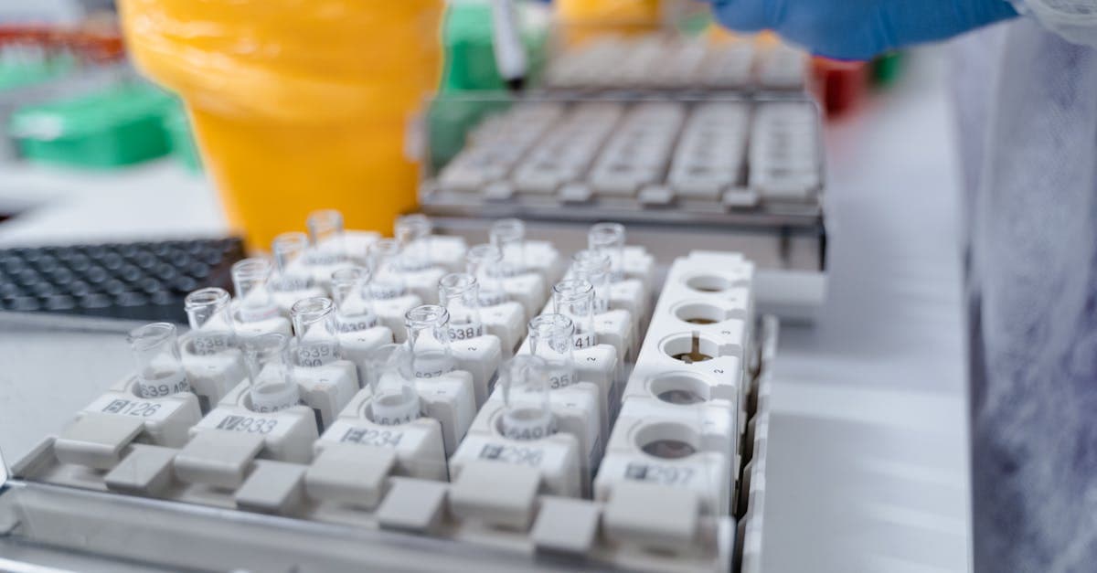 Manufacturing team conducting root cause analysis with fishbone diagram on whiteboard in a production meeting