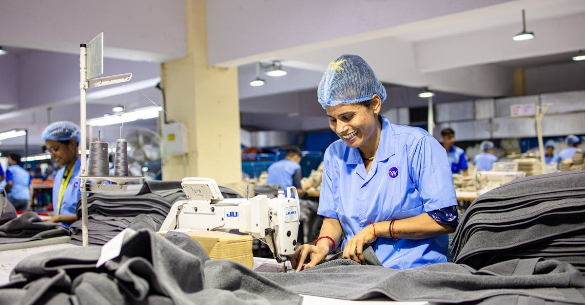 Manufacturing planner comparing ERP screen with shop floor Gantt chart schedule