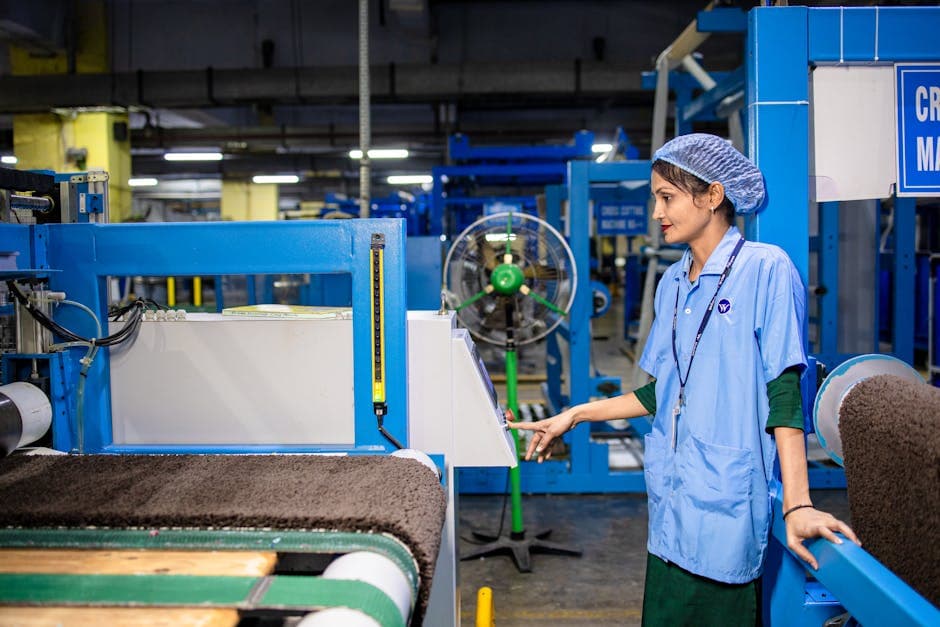 Factory floor with workers managing urgent production orders under time pressure
